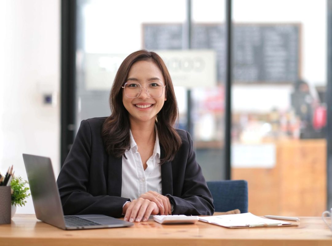 portrait-of-smiling-beautiful-business-asian-woman-2022-10-10-20-22-55-utc-scaled